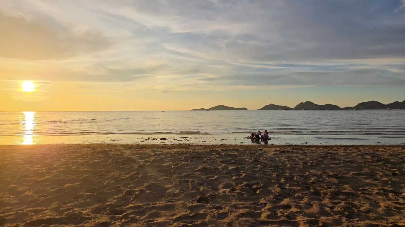 Sunset over Flores Sea from Sudamala Resort beach, Labuan Bajo Indonesia